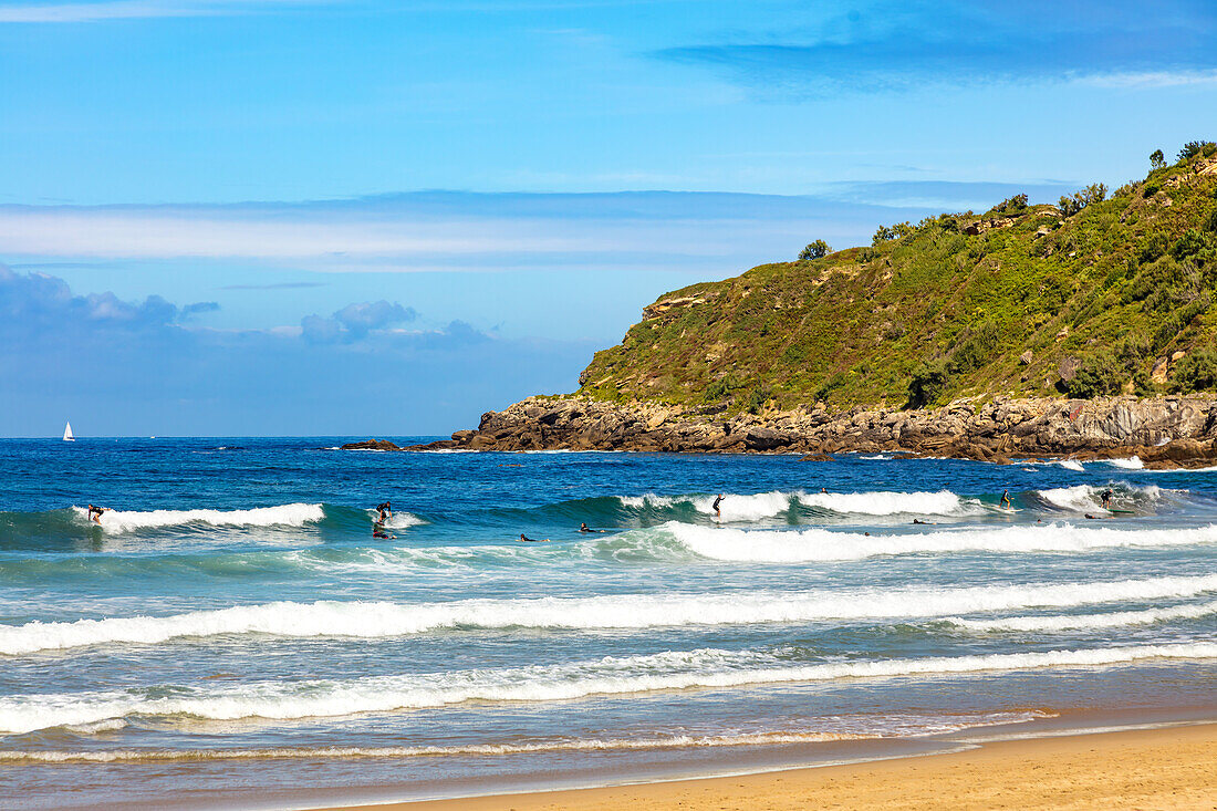 San Sebastian,Spain - September 07,2019 - Beach view,surfers and tourists