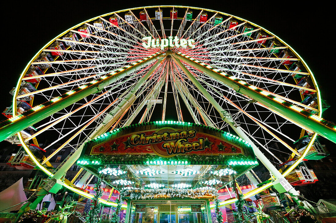 Paris. 1st district. The Tuileries Garden by night. Fun fair at the end of the year. The great wheel. Manege.