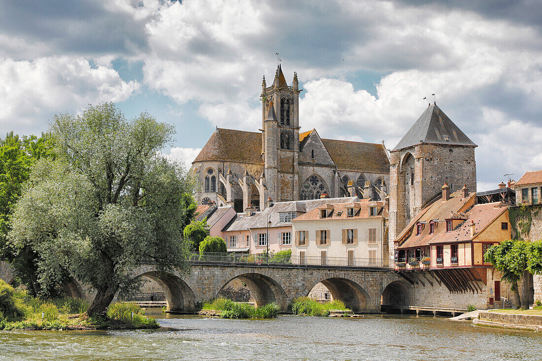 France. Seine et Marne. Medieval village of Moret sur Loing. The church and the Porte of Bourgogne.