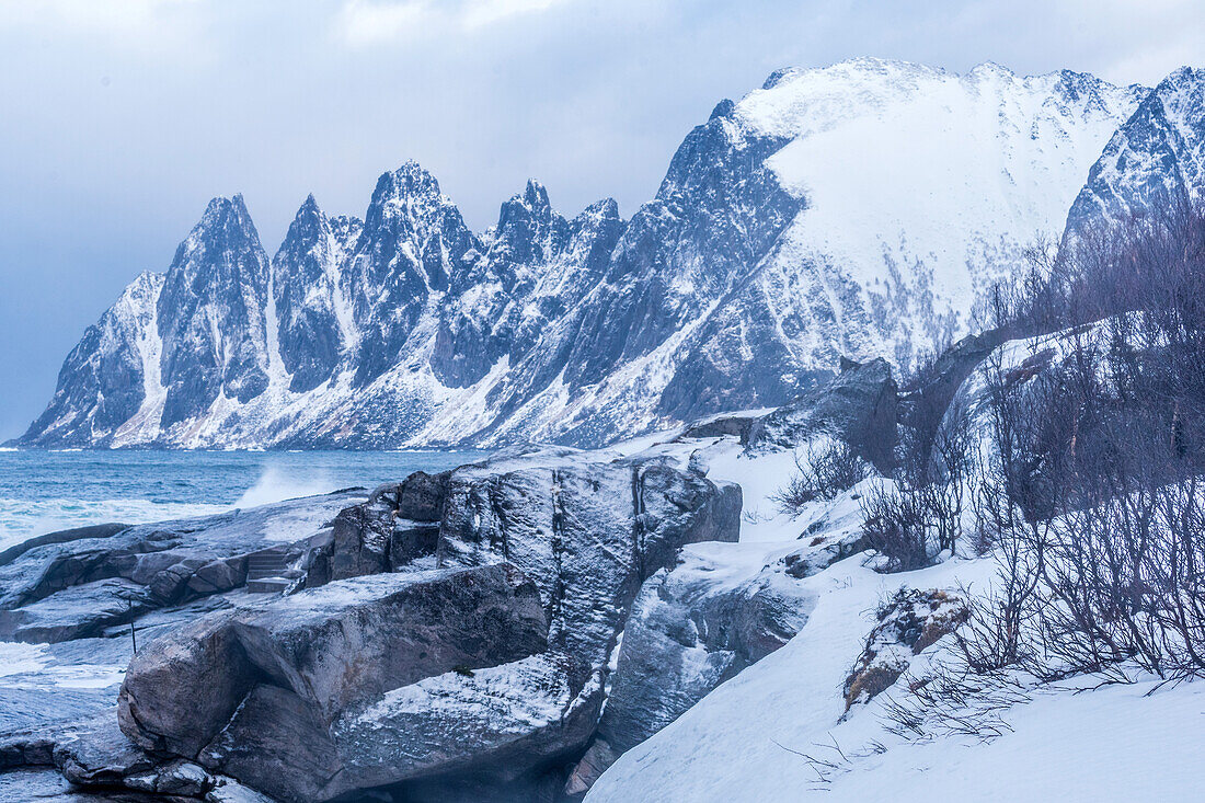 Norway,city of Tromso,Island of Senja,Tungenesset Mountains (Devil's Teeth),seen from the Steinfjord