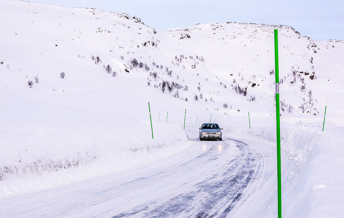 Norway,city oof Tromso,Island of Senja,snowy road