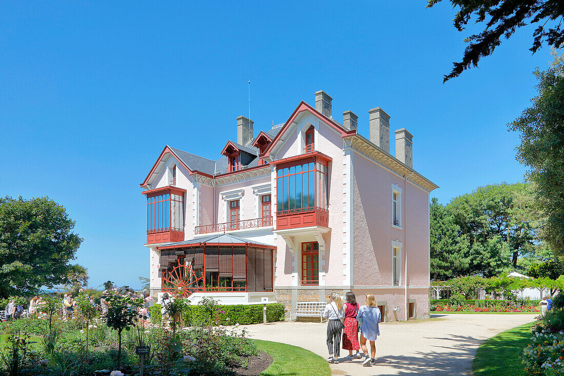 France. Normandy. Department of Manche. Granville. Christian Dior Museum during the summer. Tourists waiting at the entrance.