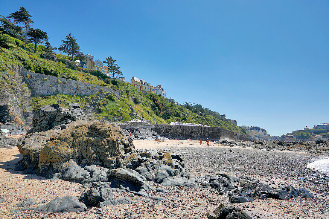 France. Normandy. Department of Manche. Granville during the summer. Receding tide. View from the coast and part of the beach.