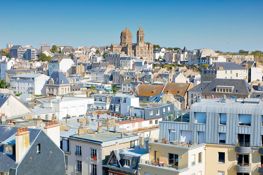 France. Normandy. Department of Manche. Granville during the summer. View of the city from the upper town. In the background,Saint Paul's Church.