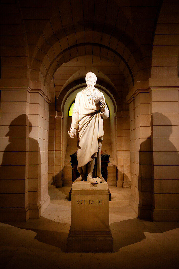 France. Paris. 5th district. The Pantheon. The crypt. Tomb and sculpture of Voltaire.