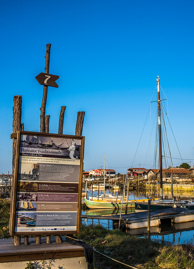 France,New Aquitaine,Arcachon Bay,information pannel on the Teste-de-Buch oyster port