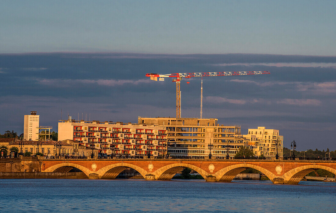 France,Gironde,Bordeaux,stone bridge and new building under construction on the right bank next to the fire station