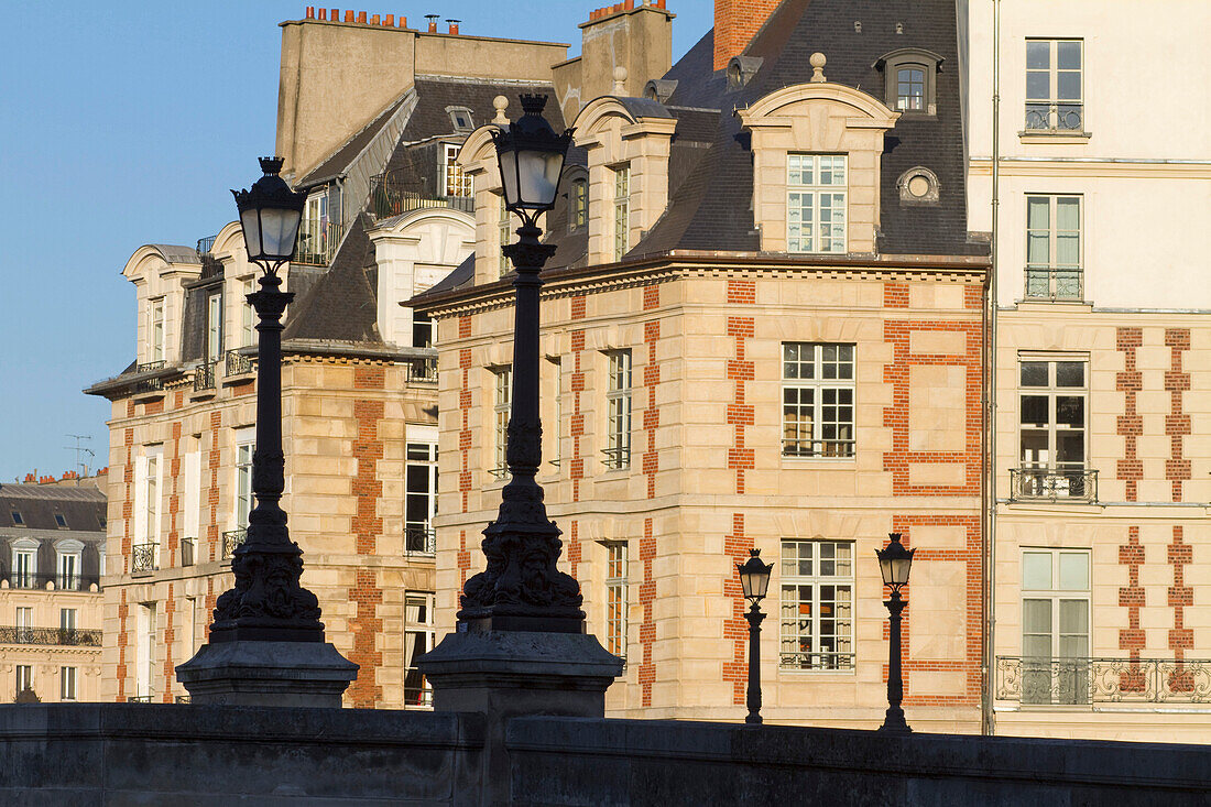 France,Paris,75,1st arrondissement,details of the Pont-Neuf with the buildings of the Ile de la Cite in the background