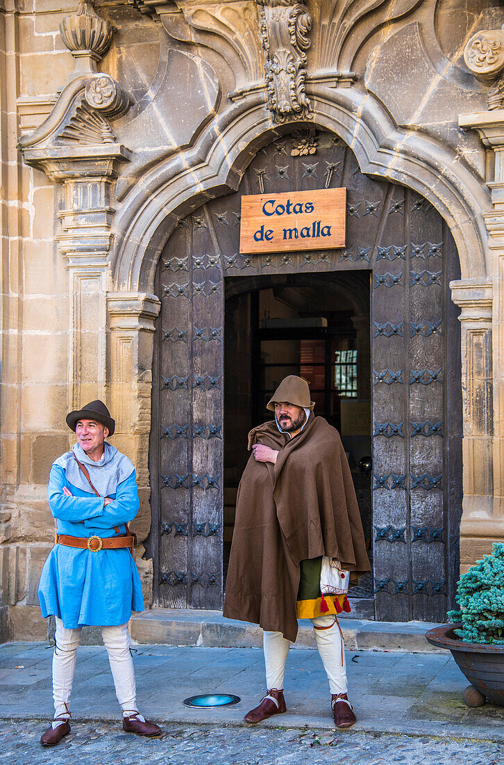 Spain,Rioja,Medieval Days of Briones (a festival declared of national tourist interest),two men costumed in front of the entrance of a Palace