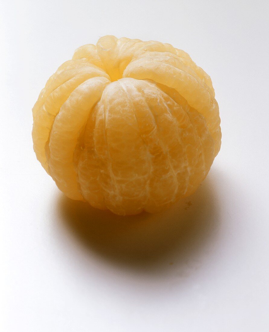 Peeled yellow grapefruit