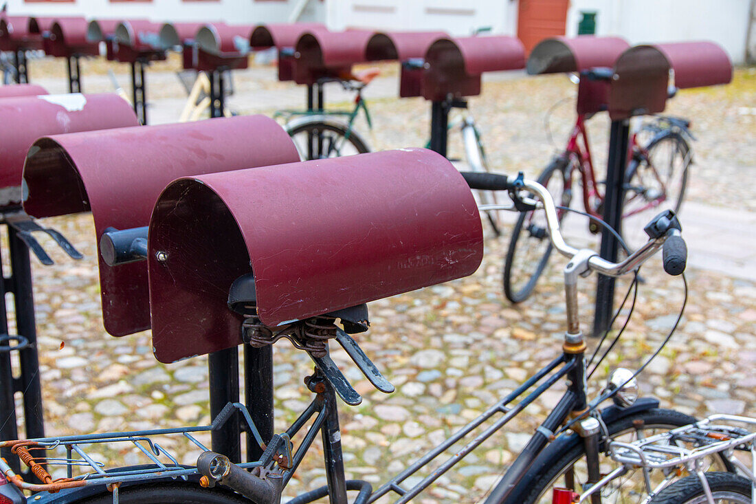 Europe,Scandinavia,Sweden. Skania. Malmoe,Seat protectors in a bicycle parking lot