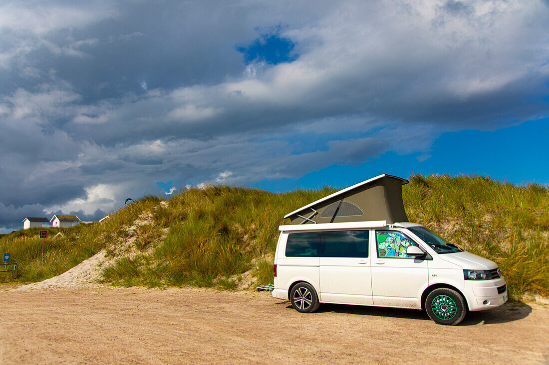 Converted van near a beach. Volkswagen Transporter