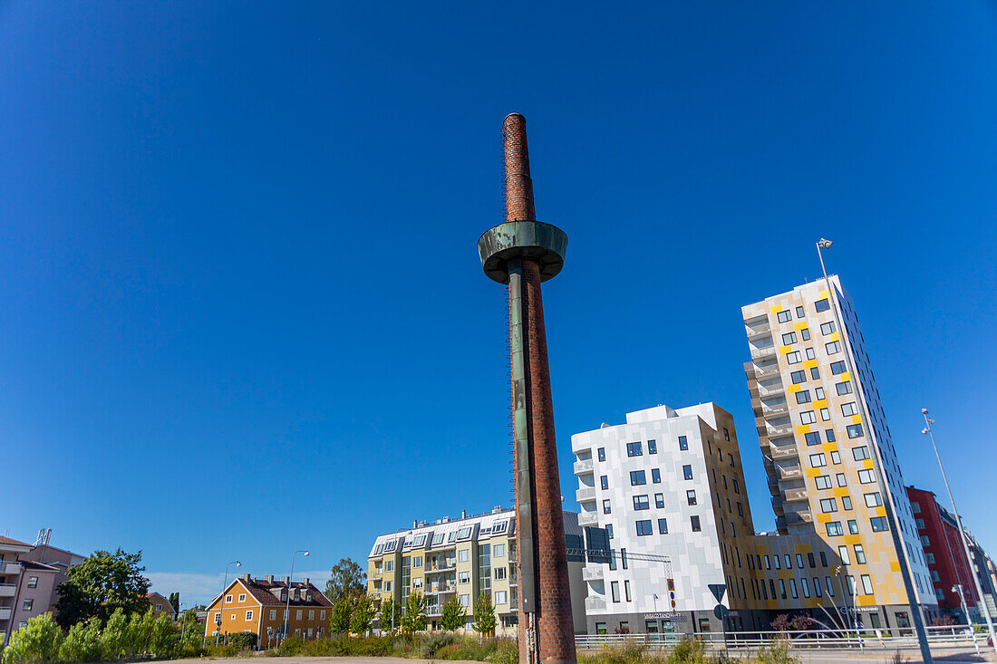 Europe,Sweden,Ostergotland County,Linkoeping. Old factory chimney made of red brick