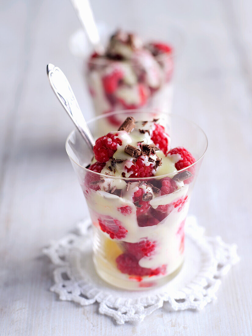 Raspberry and cream dessert with chocolate shavings