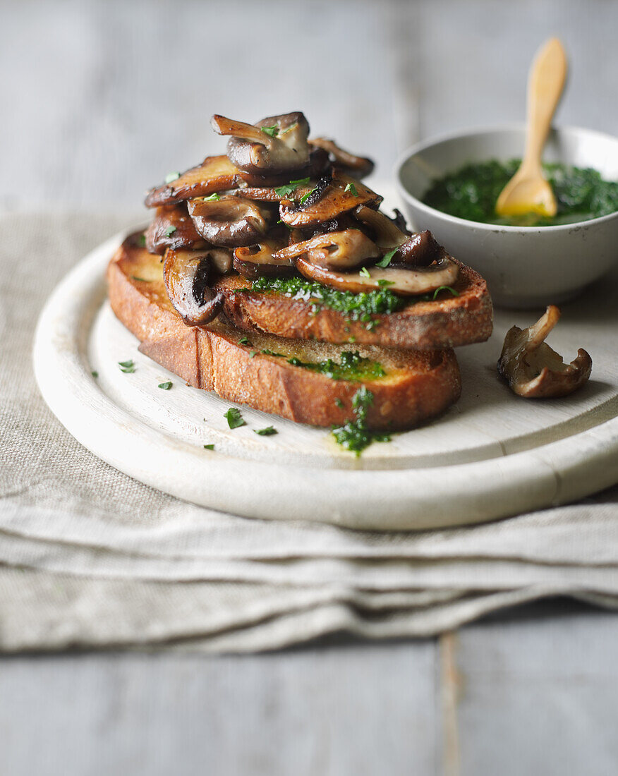 Mushroom bruschetta with herb oil