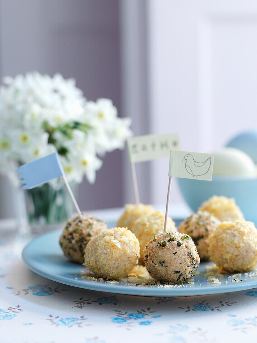 Cheese balls with breadcrumbs and herbs