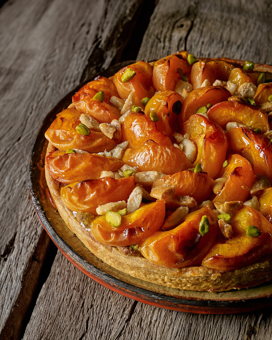 Apricot tart with pistachios and almonds