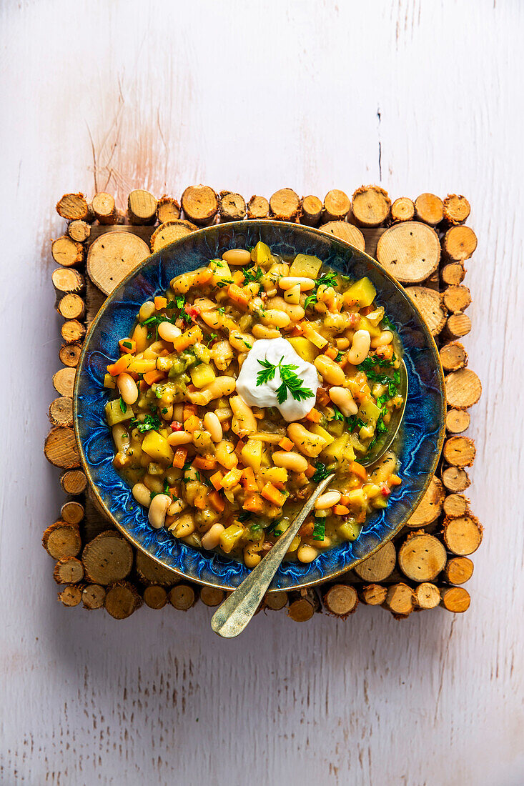 Bean stew with bacon and root vegetables