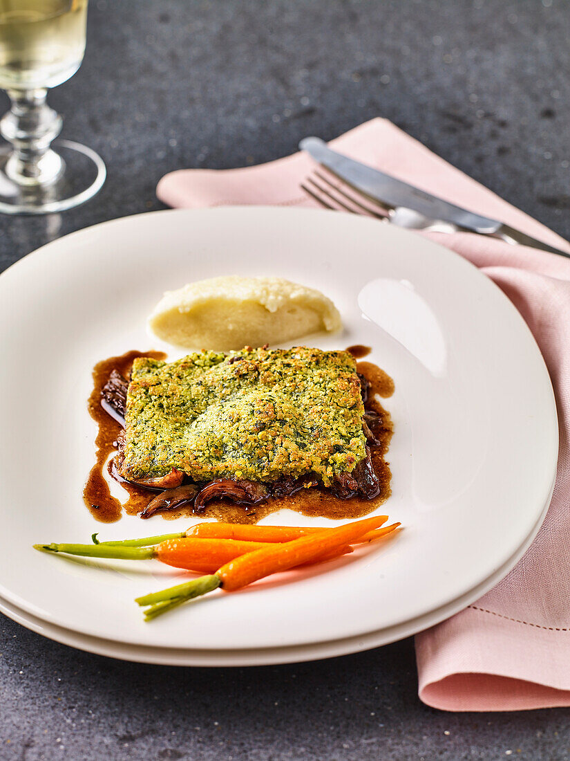 Braised duck leg with pistachio butter, carrots and celeriac and apple puree