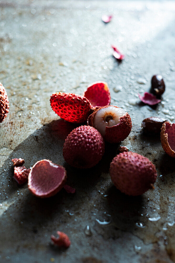 Lychees on a grey background