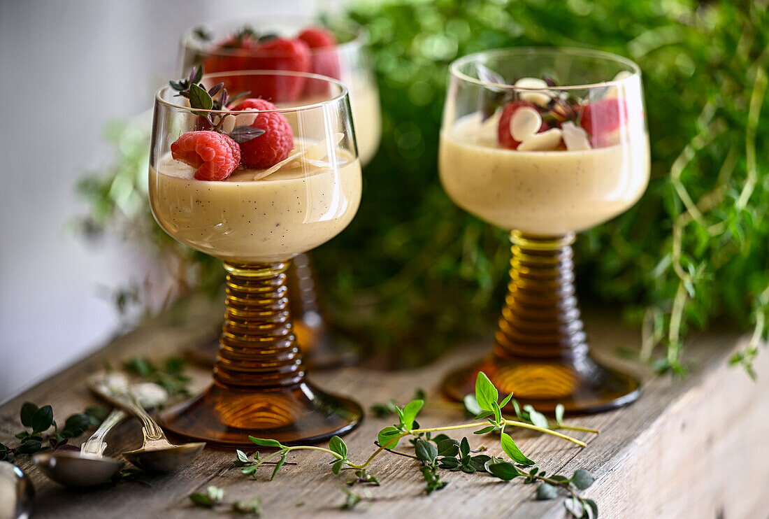 Vanilla cream with raspberries and thyme