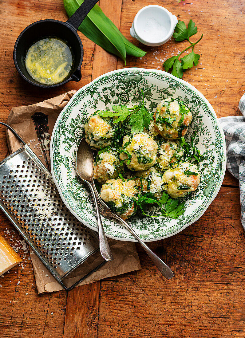 Wild garlic dumplings with herbs and melted butter