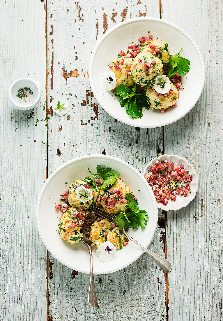 Wild garlic dumplings with bacon and herbs