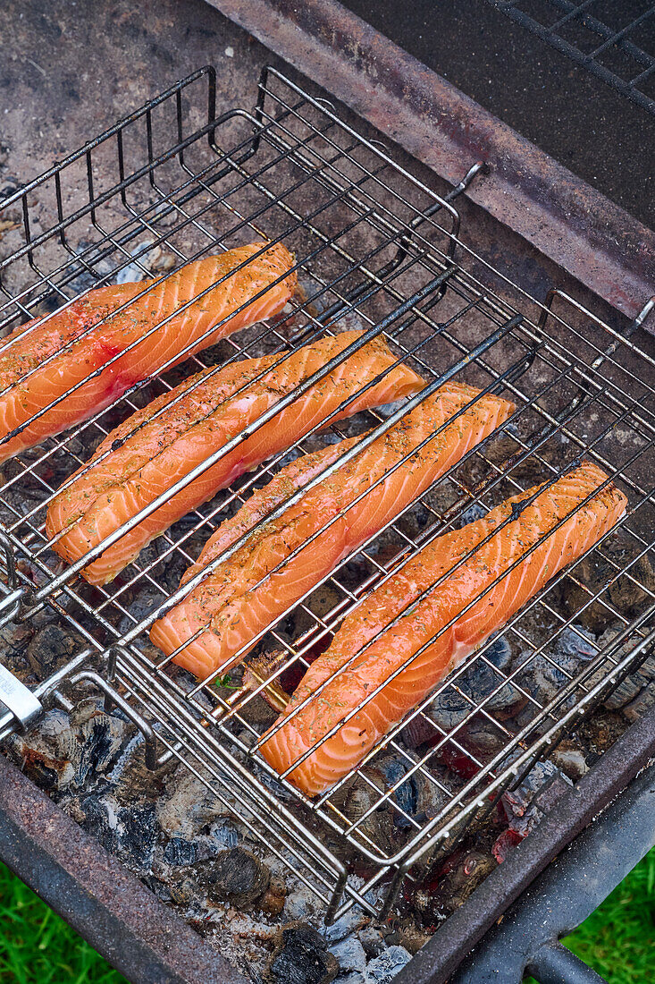 Salmon fillets in a grid on the grill