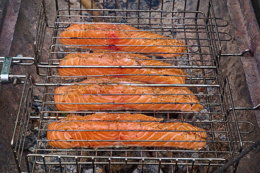 Salmon fillets in a grid on the grill