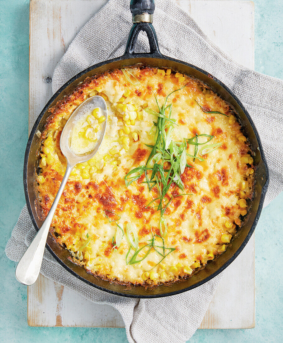 Korean corn stew topped with cheese