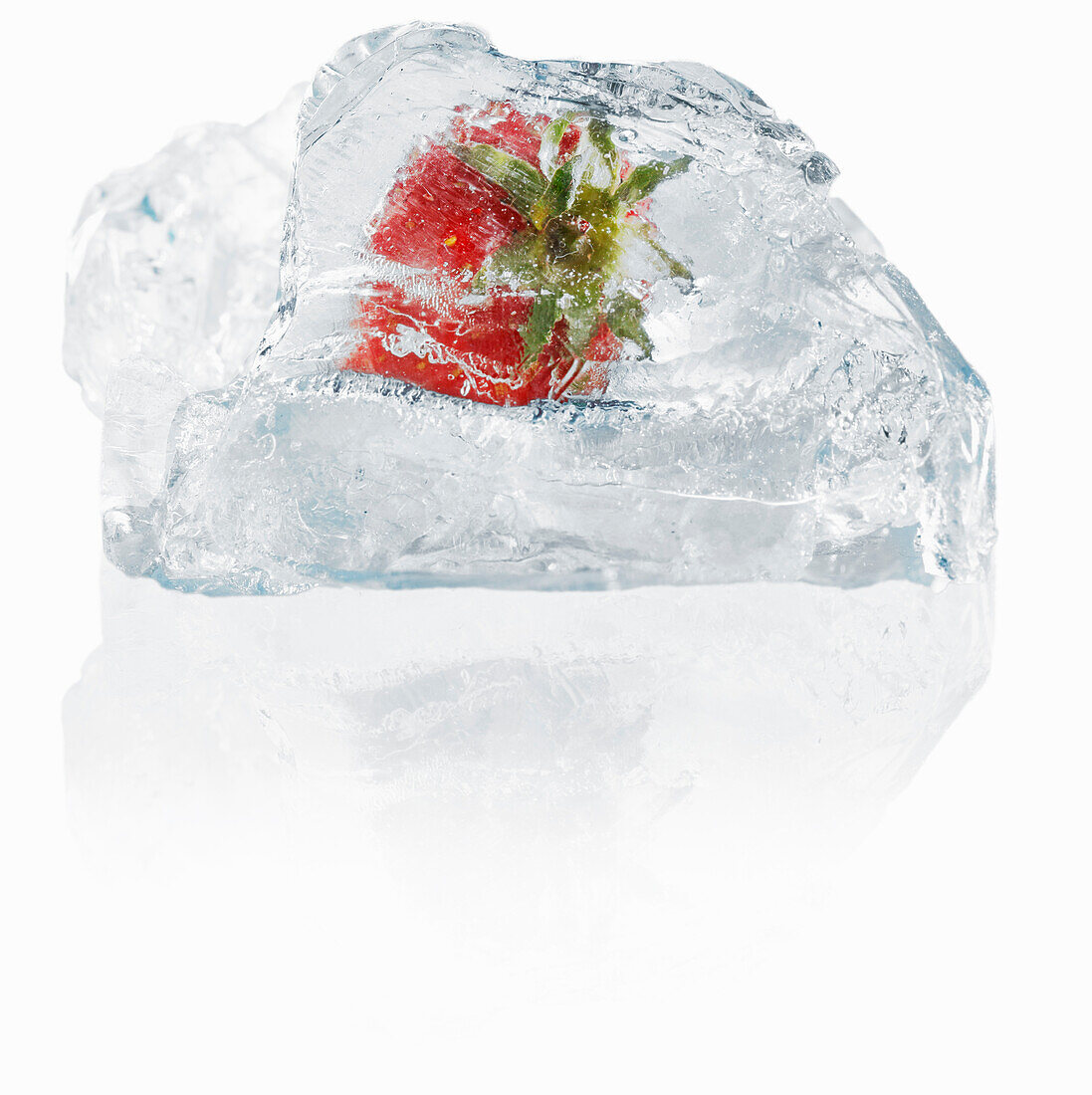 Block of ice with enclosed strawberry