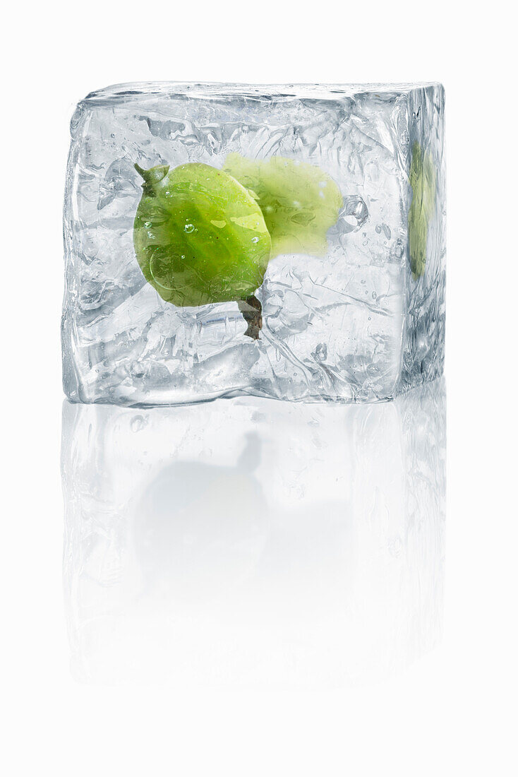 Ice cubes with enclosed gooseberries