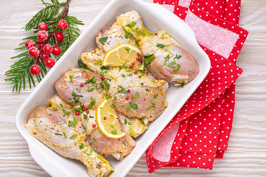 Marinated chicken drumsticks with herbs and lemon