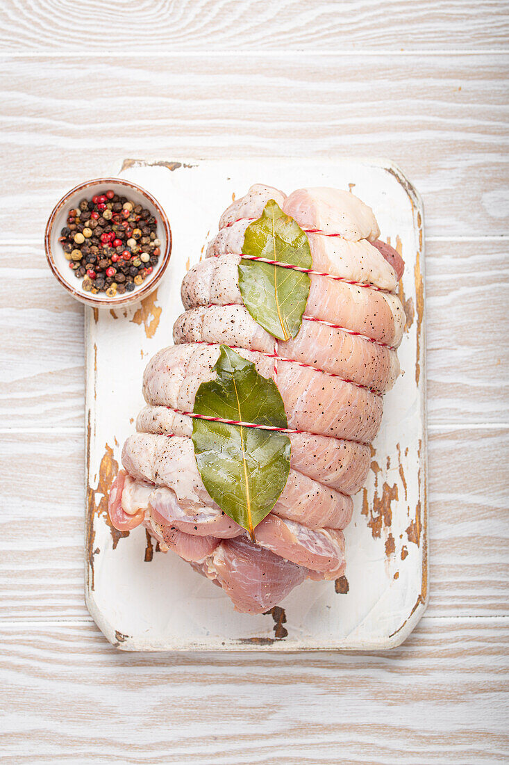 Raw porchetta (rolled pork roast)