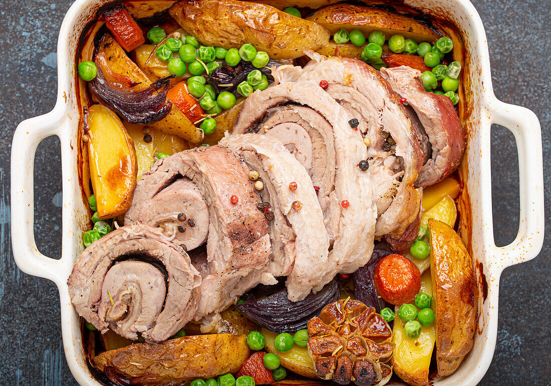 Porchetta with vegetables and potatoes