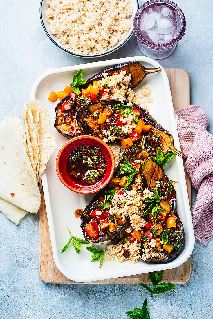 Baked aubergine with gremolata and couscous