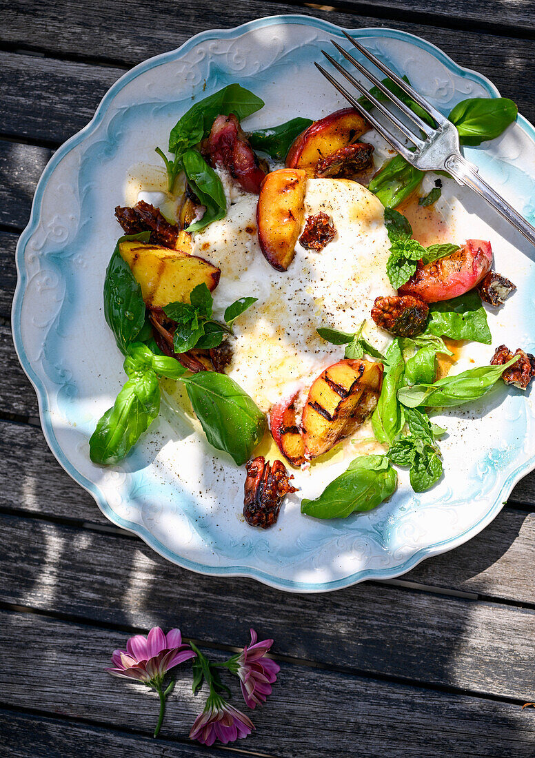 Burrata with honey, nuts and grilled peaches