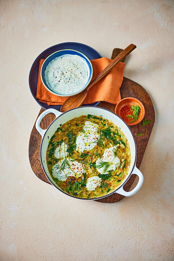 Vegan one-pot orzo dish with herb yoghurt