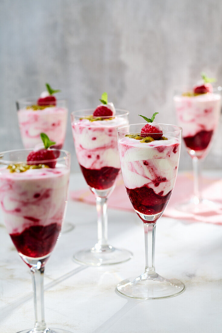 Raspberry and yoghurt dessert with passion fruit