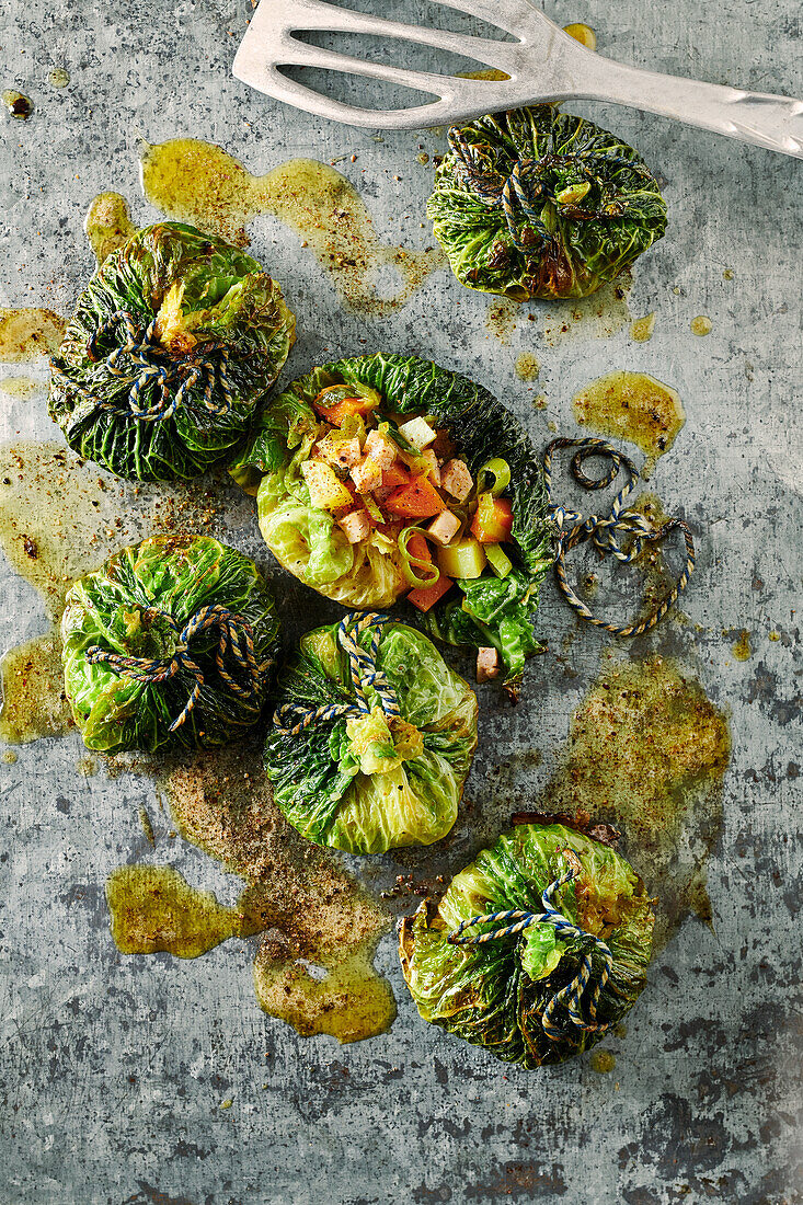 Savoy cabbage parcels filled with smoked pork and vegetables