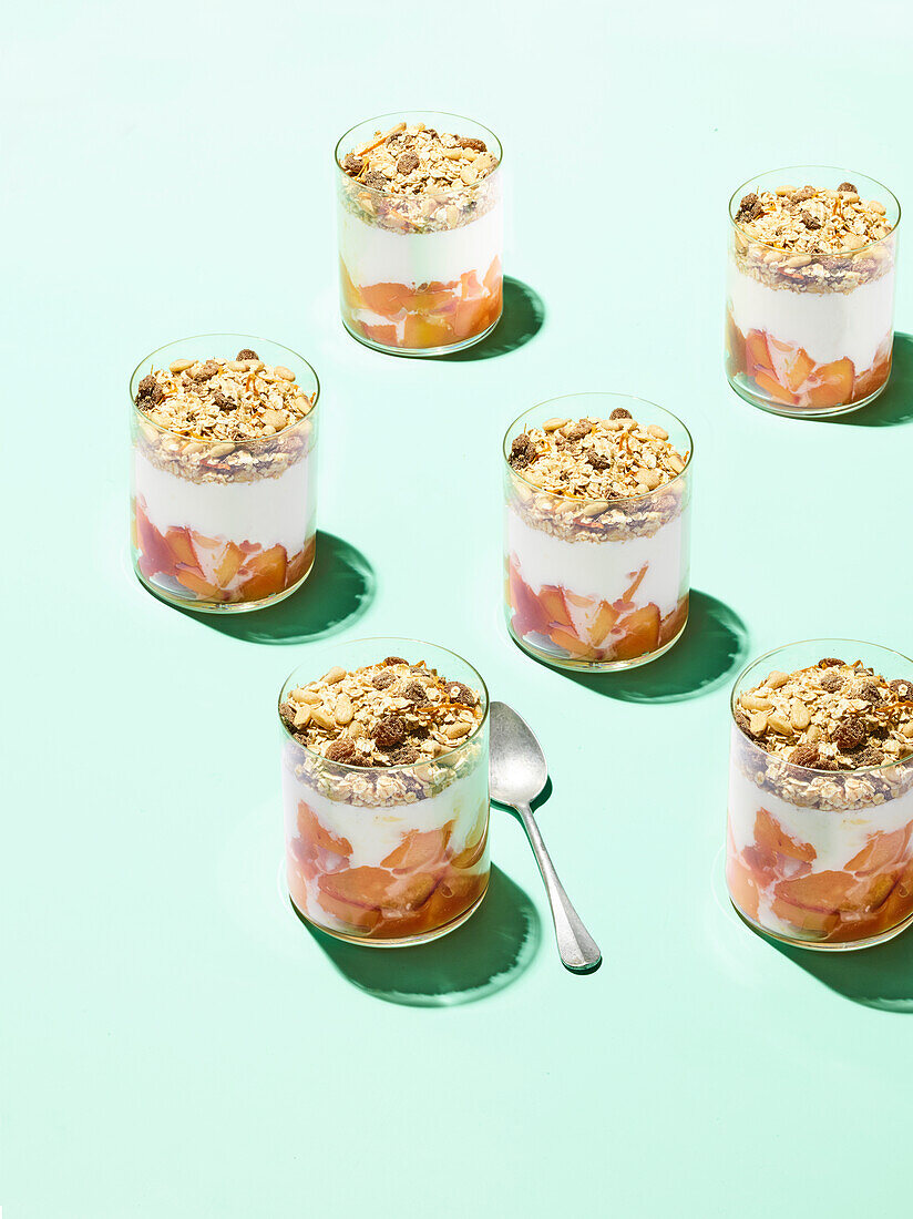 Peach and orange yoghurt with ginger and oat flakes