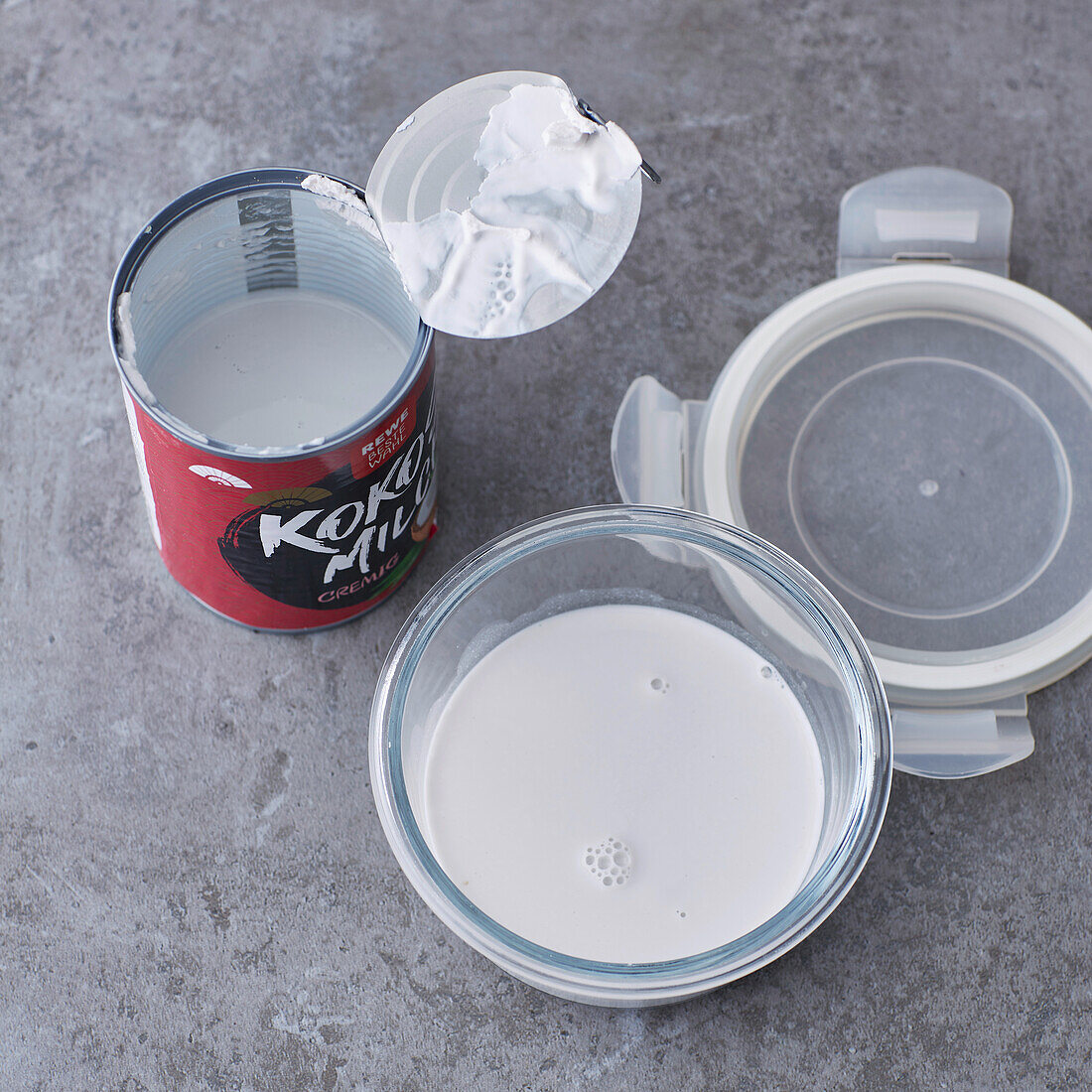 Coconut milk in can and bowl