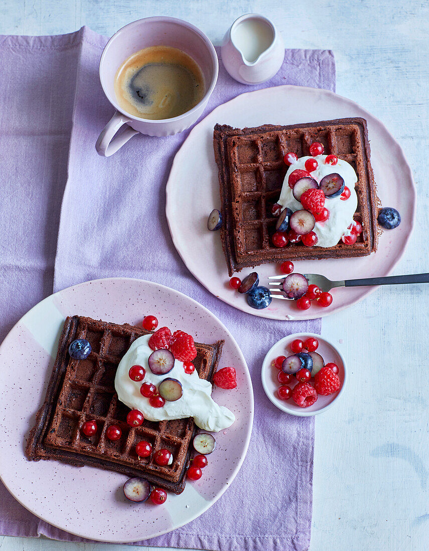 Chocolate waffles with cream and berries