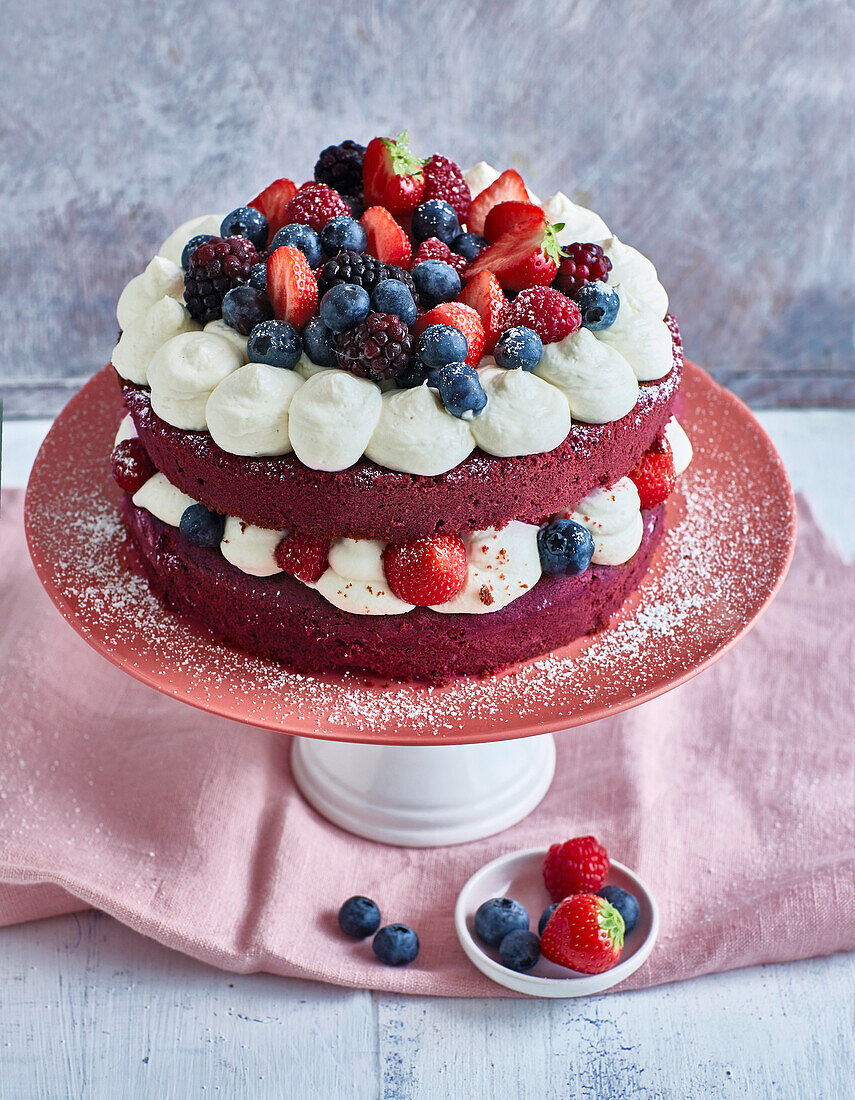 Red velvet naked cake with berries