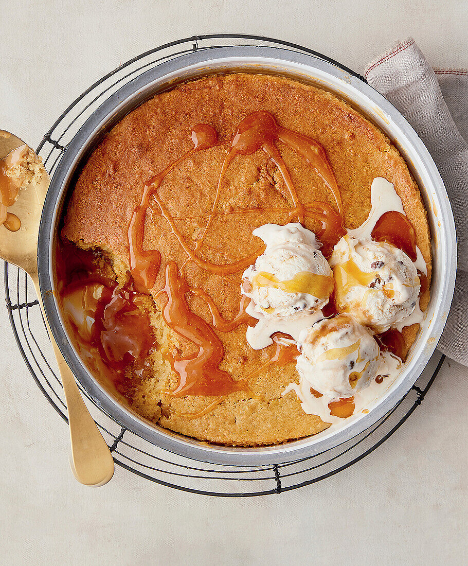 Caramel self-saucing pudding with vanilla ice cream