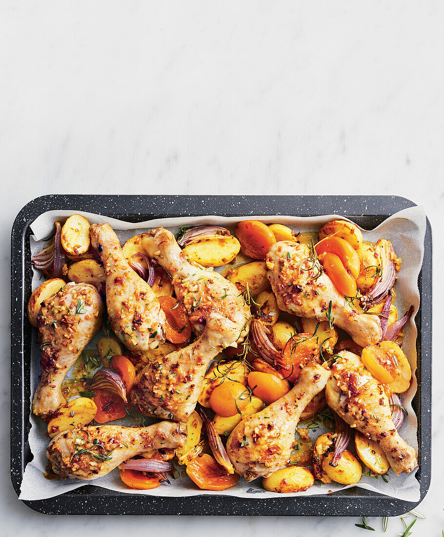 Chicken tray bake with apricots and potatoes