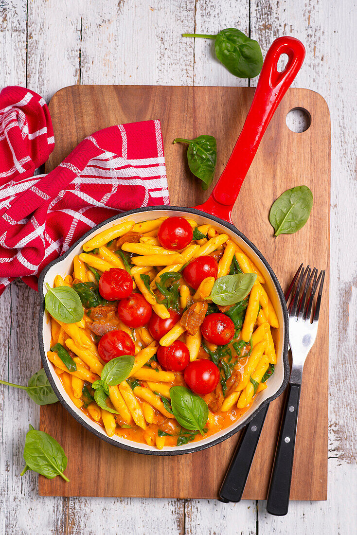 Pasta with chorizo, spinach and cherry tomatoes