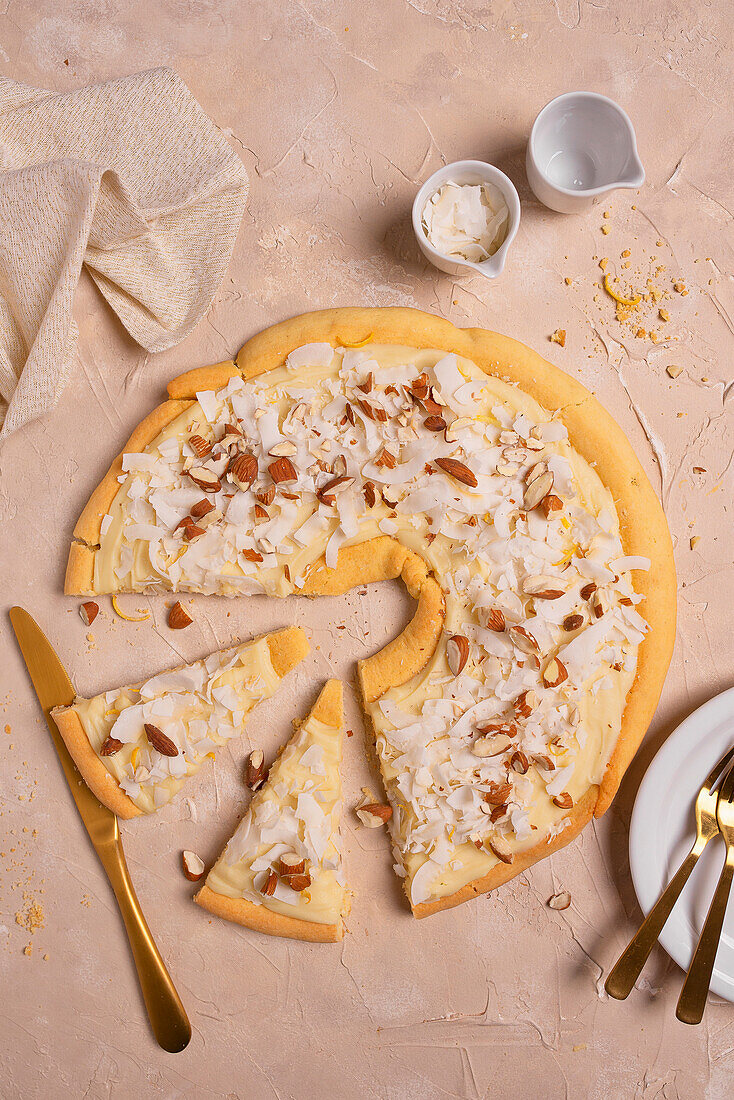 Easter cake with white chocolate, coconut flakes and almonds