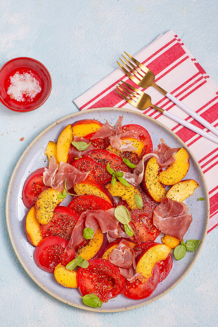 Tomato and peach salad with prosciutto