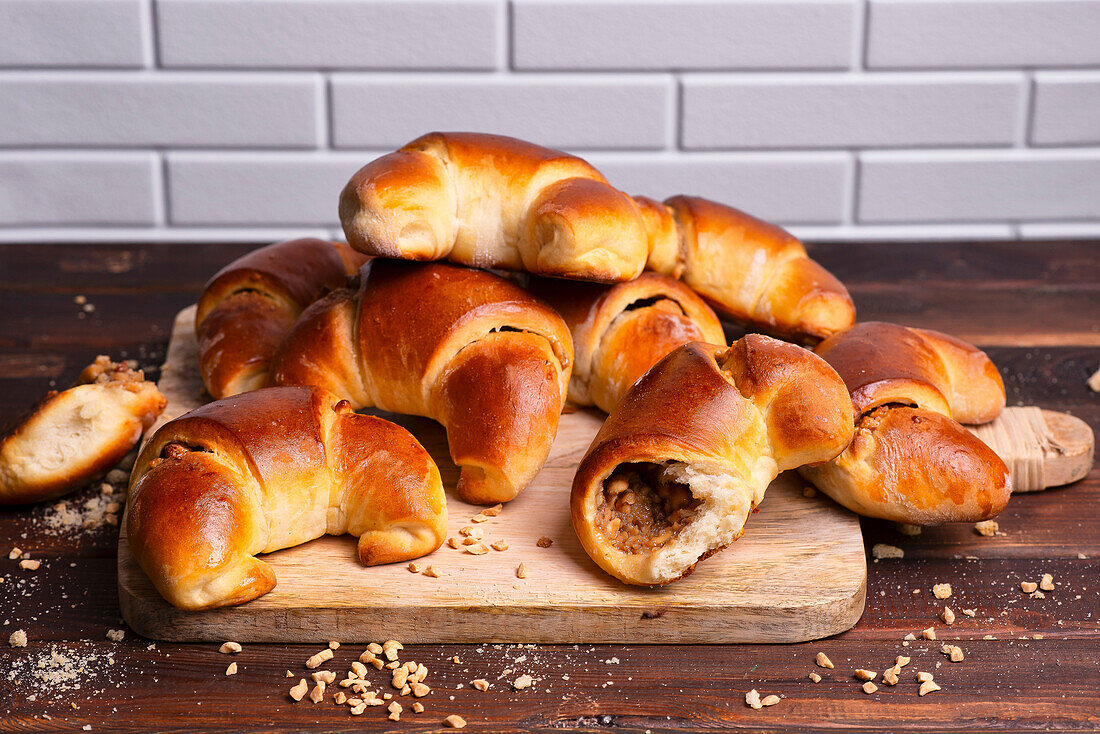 Yeast croissants with poppy seed and nut filling